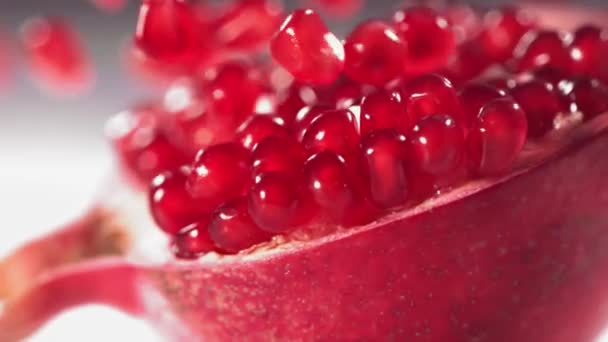 Super Close Juicy Ripe Pomegranate Grains Falling Slow Motion High — Stock Video