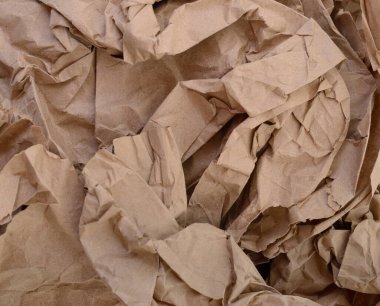 Kabataslak buruşuk kağıt. Doku kağıttan. Kahverengi renk. 