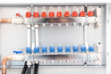 Distributor or manifold for underfloor heating with a nine circuits, concept of heated floor