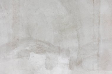 Texture or detail of facade adhesive with reinforcing mesh, a building concept