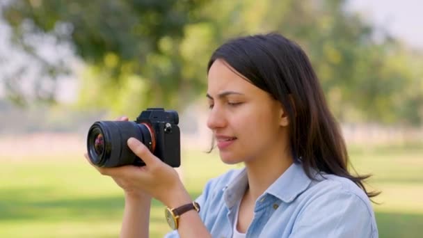 Indian Student Clicking Pictures Research Purposes Park Using Camera — Vídeos de Stock