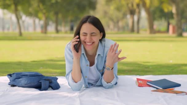 Happy Indian Girl Talking Phone Someone Park Daylight — Wideo stockowe