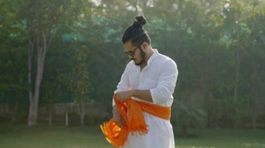 Indian man getting ready to play Holi