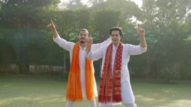Indian men doing Bhangra dance