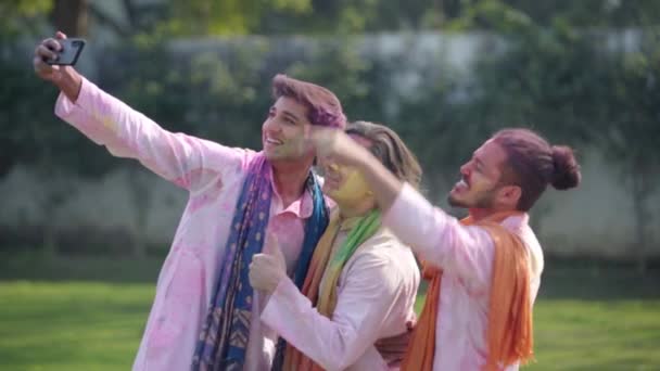 Indian Men Clicking Pictures Holi Festival — Stockvideo