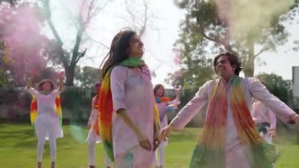 Indian Couple Throwing Holi Colors Air Celebrating Festival — Stock videók