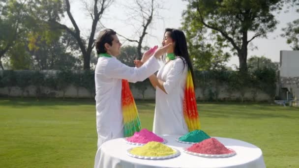 Beautiful Indian Couple Celebrating Holi Festival — Stockvideo