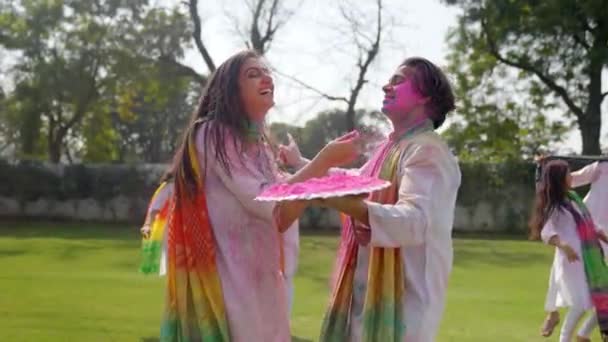 Indian Couple Enjoying Holi Party — Stockvideo