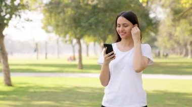 Indian woman going for a run in a park in morning