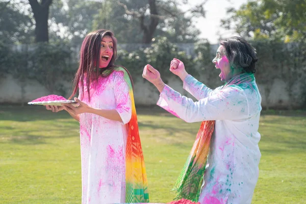 Indian man surprises his wife on Holi