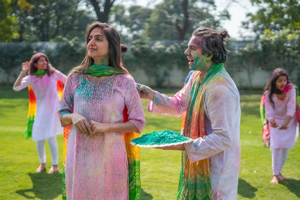 Indian husband surprises his wife on Holi festival