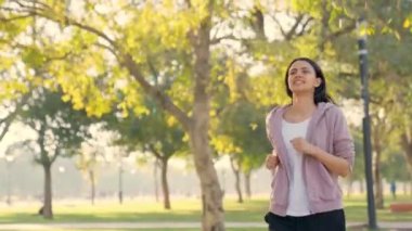 Indian woman running in a park in morning time