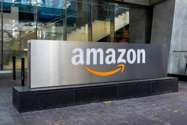 Toronto, Canada-July 2, 2018: Amazon sign at head office of Amazon Canada Fulfillment Services Inc in Toronto, an American electronic commerce and cloud computing company. clipart