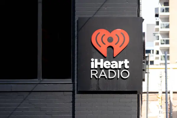 stock image Toronto, Canada- November 14, 2020: A iHeartRadio closeup sign on the wall is seen in Toronto. iHeartRadio is an app/digital platform owned by iHeart-Media. 