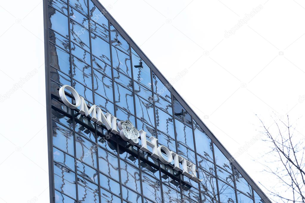Charlotte, North Carolina, USA - January 15, 2020: Sign of Omni Hotels on the wall in Charlotte, North Carolina, USA. Omni Hotels & Resorts is an American international luxury hotel company.