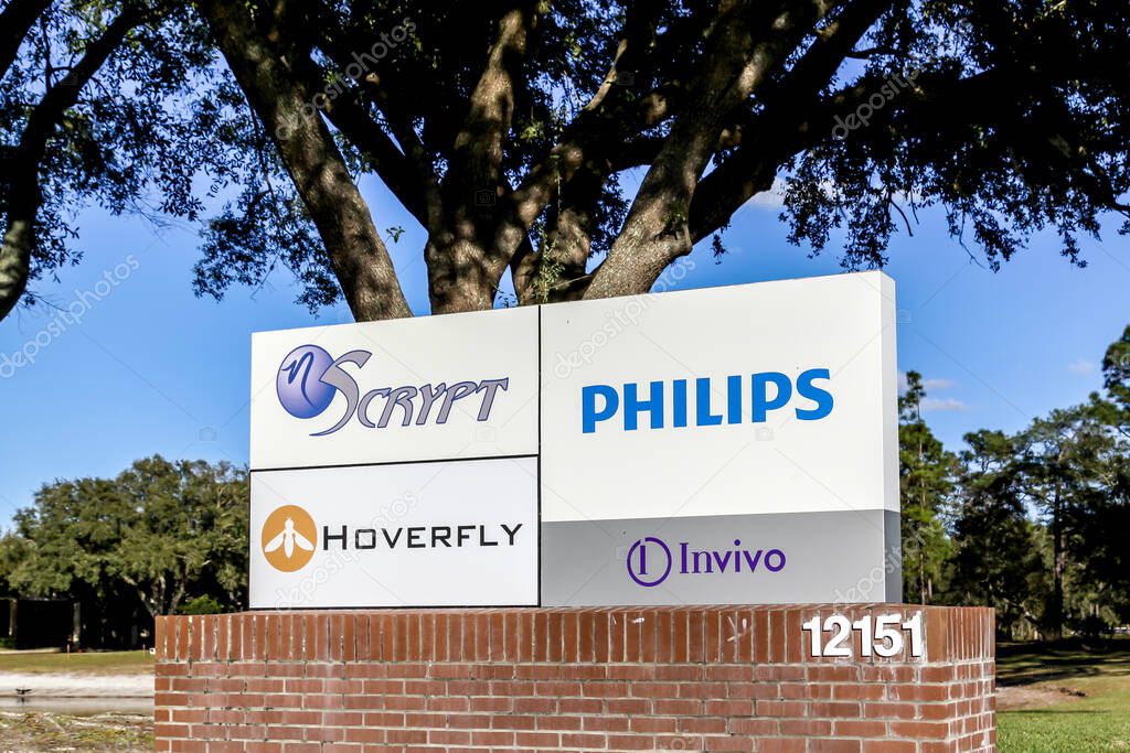 Orlando, Florida, USA- February 8, 2020: The company signs (Scrypt, Hoverfly, Philips, Invivo) on the signage outside the office building in Orlando, Florida, USA.