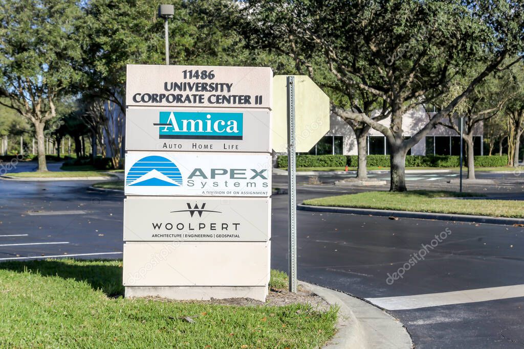 Orlando, Florida, USA- February 8, 2020: A directory sign with company name Amica, Apex Systems and Woodlpert at University Corporate Center II in Orlando, Florida, USA.
