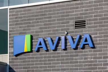 Markham: Close up of Aviva sign on the wall in Markham, Ontario. Aviva plc is a British insurance company, a general insurer and a life and pensions provider.