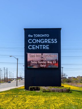 Etobicoke, Ontario, Canada - May 13, 2018: Sign of Toronto Congress Centre (TCC), an event, meeting and trade show complex in Etobicoke in Toronto, Ontario, Canada clipart