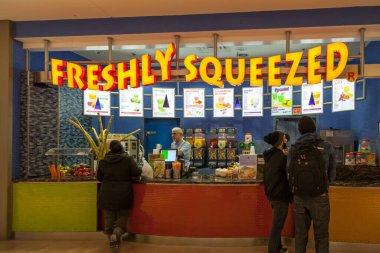 Freshly Squeezed shop in the interior shopping area in downtown Toronto, Ontario. clipart