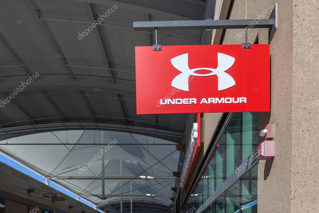 Niagara On the Lake, Canada- March 4, 2018: Under Armour store sign in Outlet Collection at Niagara. Under Armour, Inc. is an American company that manufactures footwear, sports and casual apparel.