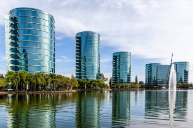 Redwood Shores, CA, USA - March 30, 2018: Oracle headquarters in Silicon Valley, CA, USA. Oracle Corporation is an American multinational computer technology corporation.  clipart