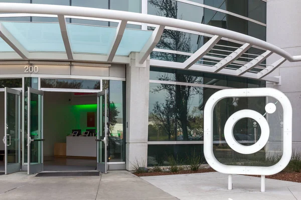 stock image Menlo Park, California, USA - March 30, 2018: Instagram logo at front door of headquarters in Silicon Valley. Instagram is a photo and video-sharing social networking service owned by Facebook, Inc. 