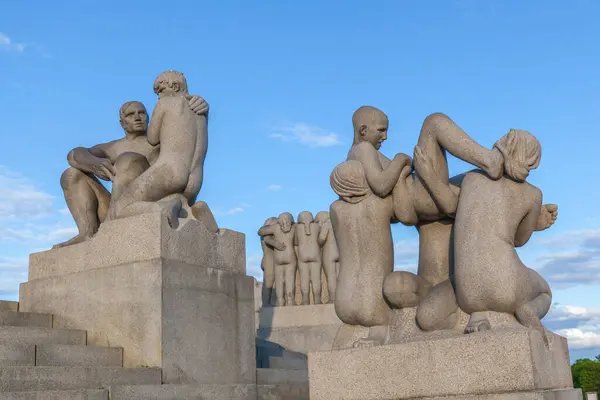 stock image OSLO, NORWAY - MAY 13, 2016: Sculptures at Vigeland Sculpture Park by Gustav Vigeland in twilight, Oslo, Norway. Vigeland Park is the world's largest sculpture park made by a single artist.