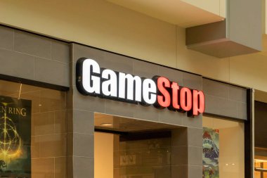 Houston, Texas, USA - February 25, 2022: GameStop store sign in a shopping mall. GameStop Corp. American video game, consumer electronics, gaming and merchandise retailer. clipart