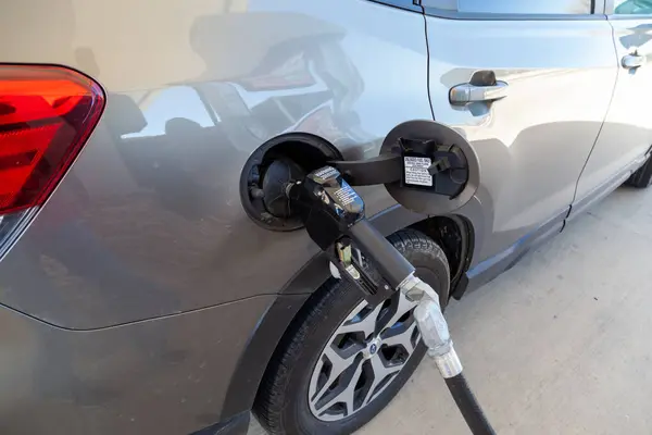 Stock image Lemont, Illinois, USA - March 27, 2022: Car refueling at a gas station.