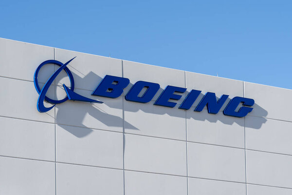 Irving, Texas, USA - March 20, 2022: Closeup of Boeing sign on the building in Irving, Texas, USA. The Boeing Company is an American multinational corporation.