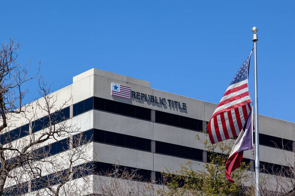 Dallas, Texas, USA - March 20, 2022: Republic Titles sign on its office building in Dallas, Texas, USA. Republic Title of Texas, Inc., is an American full-service title insurance company.