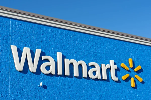 stock image Pearland, Texas, USA - February 14, 2022: Closeup of Walmart store sign on the building. Walmart Inc is an American multinational retail corporation that operates a chain of hypermarkets.