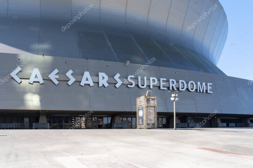 New Orleans, Louisiana, USA - February 12, 2022: Caesars Superdome sign on the building in New Orleans, Louisiana, USA. Caesars Superdome is a multi-purpose stadium.