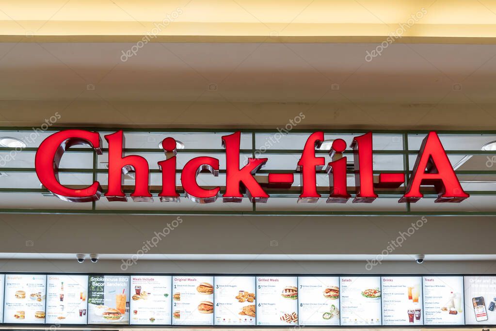 Houston, Texas, USA - February 25, 2022: Chick-fil-A restaurant sign is seen in a shopping mall. Chick-fil-A is one of the largest American fast food restaurant chains.