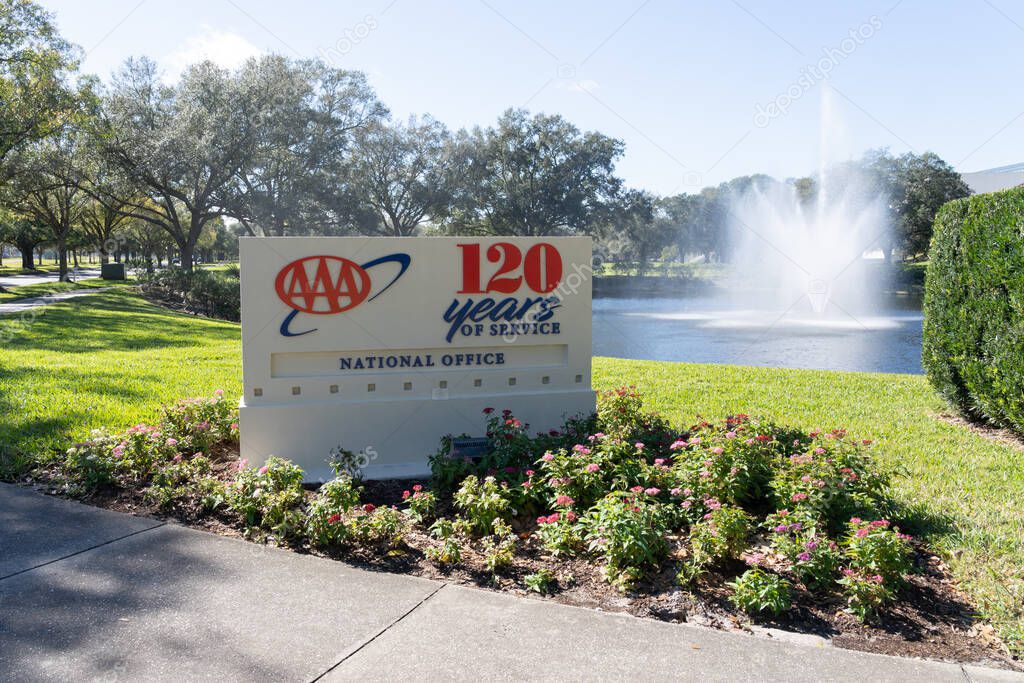 Heathrow, FL, USA - January 17, 2022: AAA sign at the entrance to their headquarters in Heathrow, FL, USA. American Automobile Association is a federation of motor clubs.