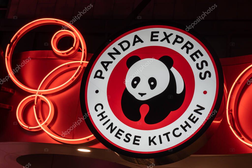 Orlando, FL, USA - February 6, 2022: Panda Express logo in the night is shown in Orlando, FL, USA. Panda Express is an American fast food restaurant chain that serves American Chinese cuisine.