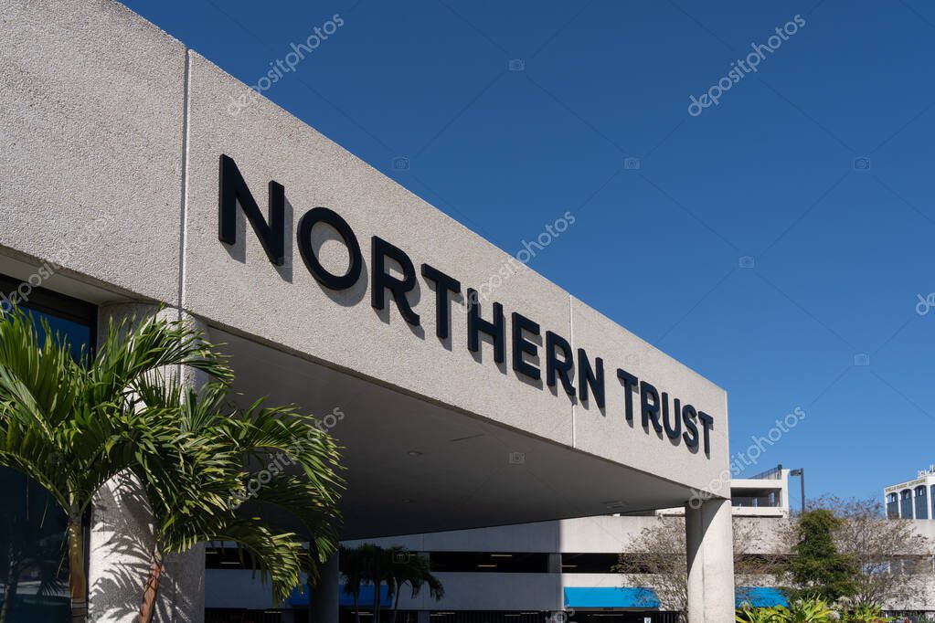 Sarasota, Florida, USA - January 11, 2022: Northern Trust sign on the building in Sarasota, Florida, USA. Northern Trust is an American financial services company.