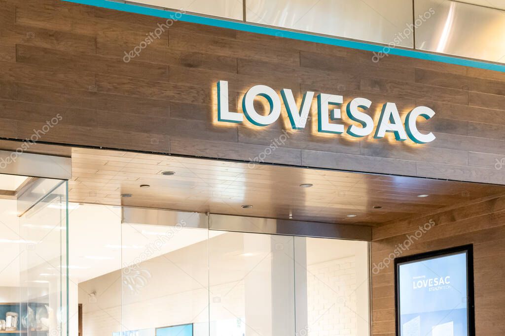 Orlando, Florida, USA - January 27, 2022: Lovesac store sign at a mall in Orlando, Florida, USA. Lovesac is an American furniture retailer, specializing in a patented modular furniture system.