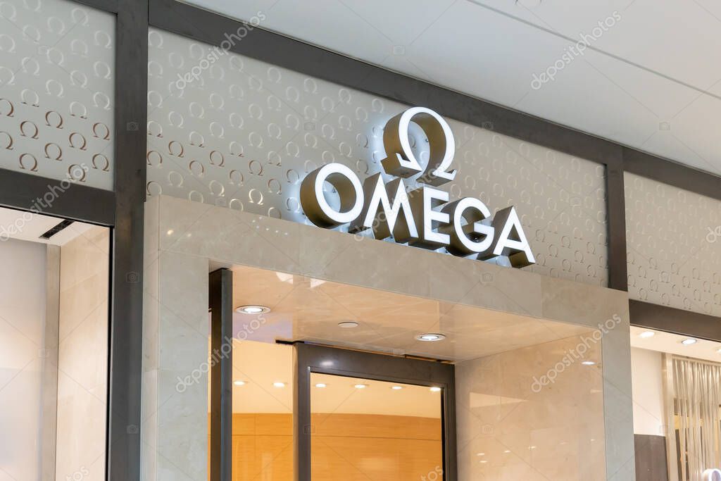 Houston, Texas, USA - February 25, 2022: Omega store sign is seen in a shopping mall. Omega SA is a Swiss luxury watchmaker.