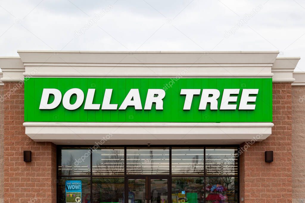 Lansing, Michigan, USA - March 30, 2022: A Dollar Tree store sign on the building. Dollar Tree is an American multi-price-point chain of discount variety stores.