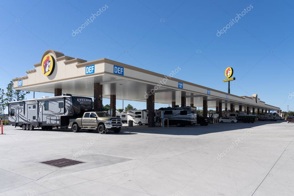 Daytona Beach, FL, USA - January 17, 2022: A Buc-ee's gas station in Daytona Beach, FL, USA. Buc-ee's is a chain of travel centers known for clean bathrooms and many fueling positions.