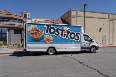 A Tostitos truck is shown. Yermo, CA, United States, on May 29, 2023. Tostitos is a brand of Frito-Lay that produces different tortilla chips and a range of accompanying dips. clipart