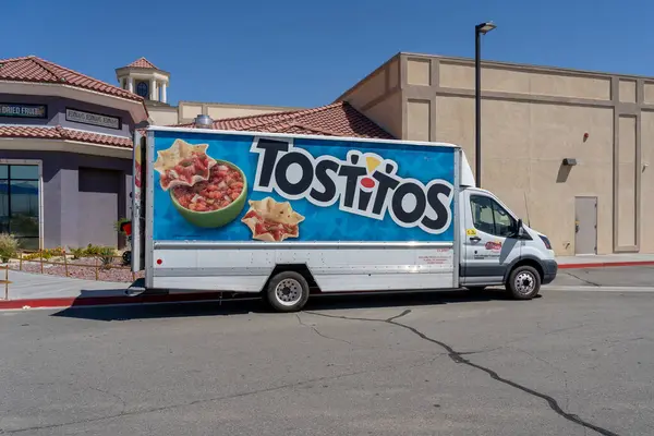 stock image A Tostitos truck is shown. Yermo, CA, United States, on May 29, 2023. Tostitos is a brand of Frito-Lay that produces different tortilla chips and a range of accompanying dips.