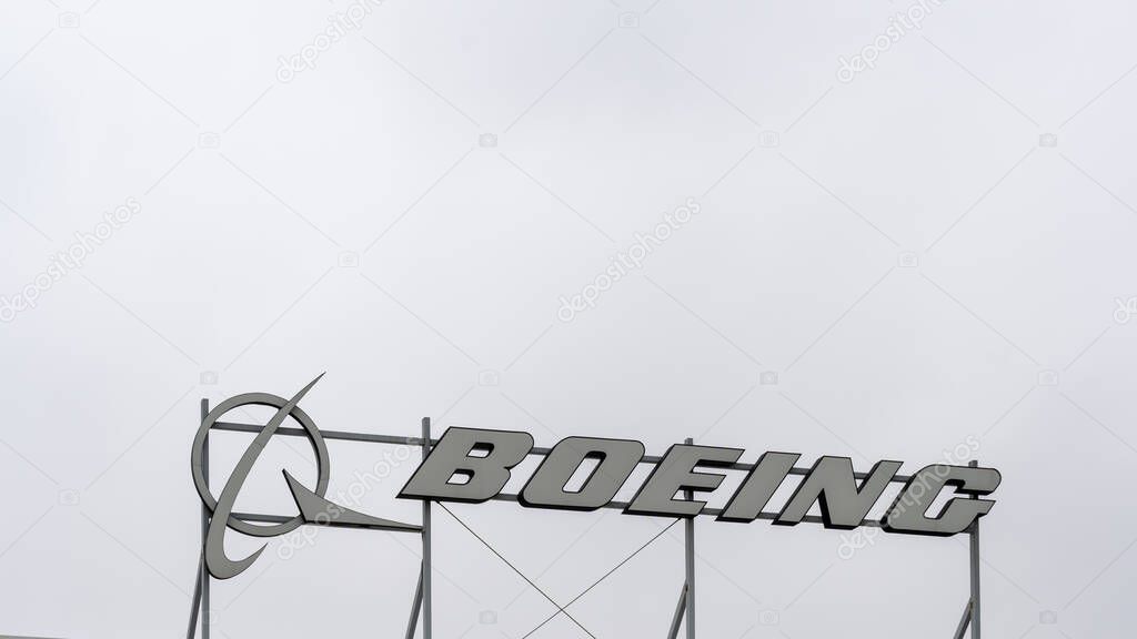 Close up of the Boeing logo and sign on the building. El Segundo, CA, USA - May 28, 2023. The Boeing Company is an American multinational corporation.