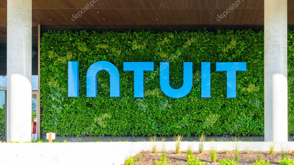 Close up of Intuit sign on the building at its headquarters in Mountain View, California, USA - June 7, 2023. Intuit Inc. is an American business software company.