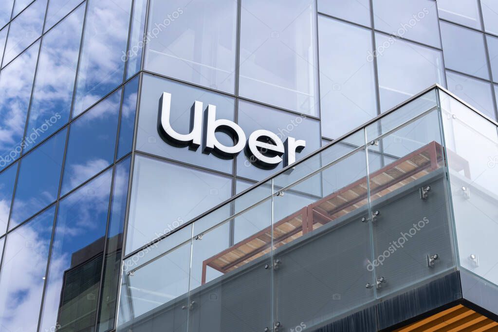 Uber sign on its headquarters building in San Francisco, California, USA - June 6, 2023. Uber Technologies is a transportation conglomerate.