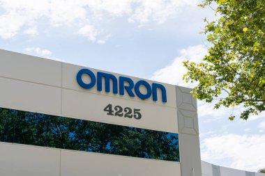 Omron Robotics and Safety Technologies office in Pleasanton, California, USA - June 12, 2023. Omron is an Automation company. clipart