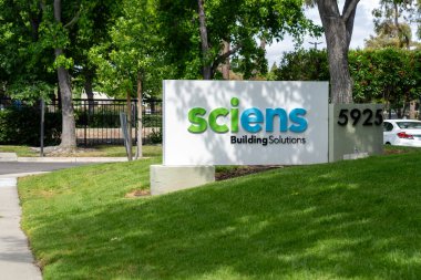 Sciens Building Solutions sign on the building at headquarters in Pleasanton, Ca, USA - June 12, 2023. Sciens Building Solutions is a company focused on the fire detection and security services sector clipart