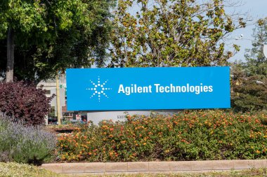 Agilent Technologies signage at its headquarters in Santa Clara, California, USA - June 9, 2023, an American company that provides instruments, software, services for laboratories clipart